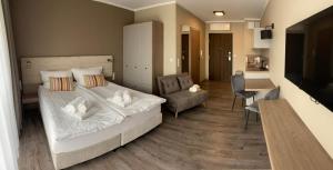 Posteľ alebo postele v izbe v ubytovaní Bel Mare Apartament E338 FREE PARKING