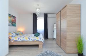 Postel nebo postele na pokoji v ubytování House Roberto 1790