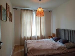 Posteľ alebo postele v izbe v ubytovaní Apartament Zoja