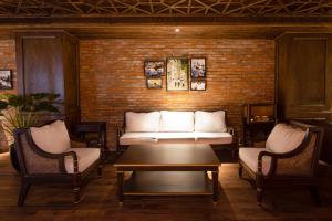 Posezení v ubytování Cochin Sang Hotel