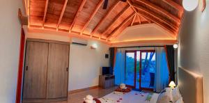 Postel nebo postele na pokoji v ubytování Sabba Beach Suite , Fodhdhoo - Maldives + 37 fotografií