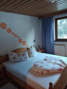 A bed or beds in a room at Ferienwohnung Nancy