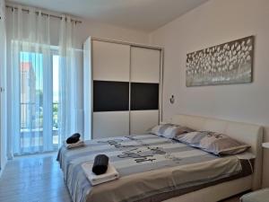 Posteľ alebo postele v izbe v ubytovaní Apartment Milana