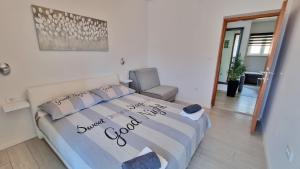 Posteľ alebo postele v izbe v ubytovaní Apartment Milana