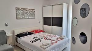 Posteľ alebo postele v izbe v ubytovaní Apartment Milana