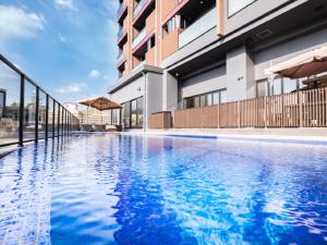Bazén v ubytování LiVEMAX RESORT Miyahama Ocean View nebo v jeho okolí + 37 fotografií
