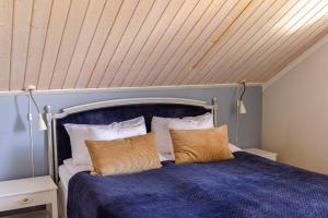 Säng eller sängar i ett rum på Rosenhill Bed & Breakfast