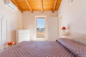A bed or beds in a room at Villa Pussacra by BarbarHouse