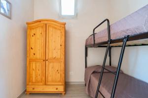 A bed or beds in a room at Villa Pussacra by BarbarHouse