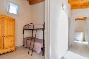 A bed or beds in a room at Villa Pussacra by BarbarHouse
