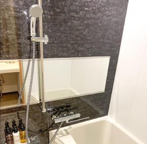 Vannituba majutusasutuses HOTEL LiVEMAX Kyoto Nijojonishi
