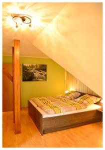 Кровать или кровати в номере Ferienhof Kürschner