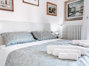 Postelja oz. postelje v sobi nastanitve Appartamento Dario Campana 74 - Affitti Brevi Italia