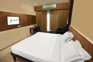Letto o letti in una camera di Hotel Fortune