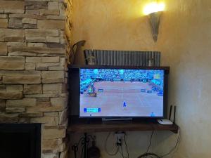 A television and/or entertainment centre at Casa Ramoncico. Finca el Campillo