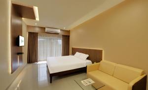 Letto o letti in una camera di Hotel Fortune