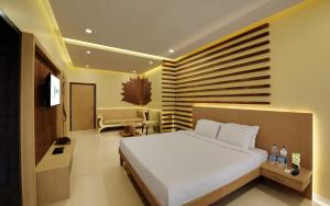 Letto o letti in una camera di Hotel Fortune