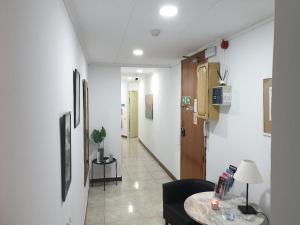 TV a/nebo společenská místnost v ubytování Hostal Absolut Stay