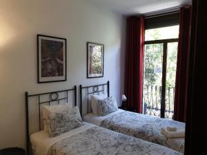Postel nebo postele na pokoji v ubytování Hostal Absolut Stay