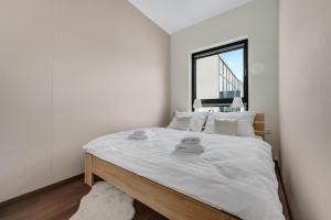 Postel nebo postele na pokoji v ubytování Metropolitan Star Apart Hotel