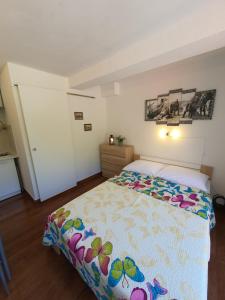 Ein Bett oder Betten in einem Zimmer der Unterkunft Apartments - Buffet 2B
