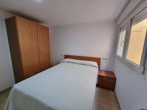 Łóżko lub łóżka w pokoju w obiekcie Terrazas del Cantábrico