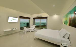 Letto o letti in una camera di Hotel Fortune