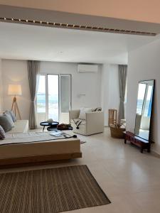 Uma área de estar em Portobello Boutique Hotel
