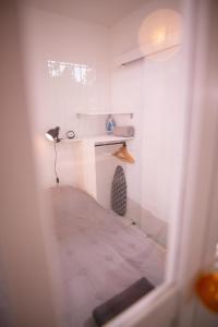 a view of a room with a desk in a room at Charmant Studio au coeur de Jaurès in Belfort