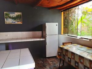 Kuhinja oz. manjša kuhinja v nastanitvi Hermosa Villa Hospedaje