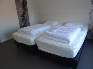 Postel nebo postele na pokoji v ubytování Kustverhuur, Appartement sandra