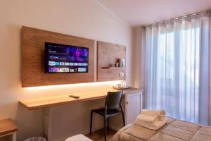TV a/nebo společenská místnost v ubytování Hotel Palazzuolo