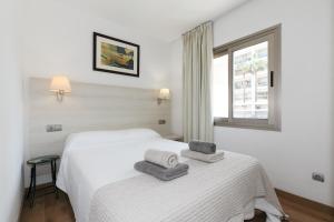 Posteľ alebo postele v izbe v ubytovaní UHC Michelangelo Apartments