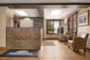 The lobby or reception area at Days Inn by Wyndham Fort Collins