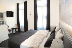 Μια τηλεόραση ή/και κέντρο ψυχαγωγίας στο DAC50 Luxurious apartment Domburg