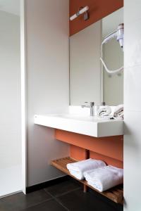 Kylpyhuone majoituspaikassa HOTEL LE 25