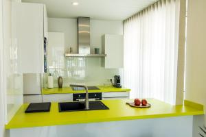 A kitchen or kitchenette at baadhaus - 4 Sterne Superior