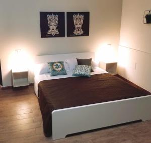 Postel nebo postele na pokoji v ubytování A due passi dal centro Sweet Rooms