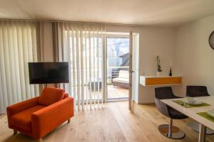 A television and/or entertainment centre at baadhaus - 4 Sterne Superior