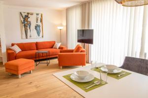 A seating area at baadhaus - 4 Sterne Superior