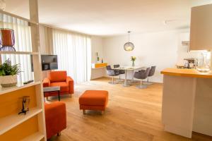 A television and/or entertainment centre at baadhaus - 4 Sterne Superior