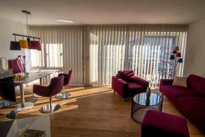 A seating area at baadhaus - 4 Sterne Superior