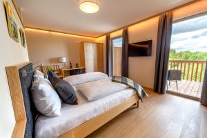 Cama o camas de una habitación en Weingut Dreisiebner Stammhaus