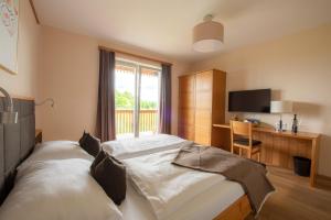 Cama o camas de una habitación en Weingut Dreisiebner Stammhaus
