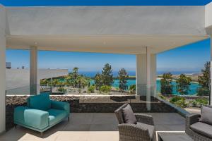 a living room with a view of the ocean at Villa Abama in Tejina de Isora