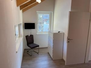 TV a/nebo společenská místnost v ubytování Haus Seltschach