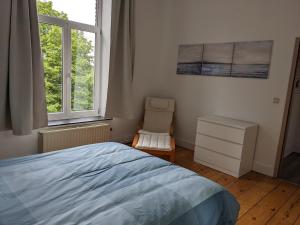 Postel nebo postele na pokoji v ubytování Appart'Huy + 3 fotografie