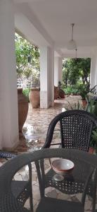 Posedenie v ubytovaní Colazione in giardino con vista mare