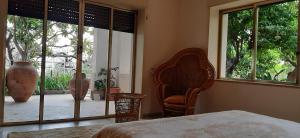 Posteľ alebo postele v izbe v ubytovaní Colazione in giardino con vista mare