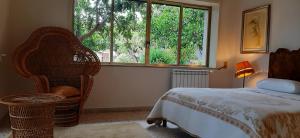 Posteľ alebo postele v izbe v ubytovaní Colazione in giardino con vista mare